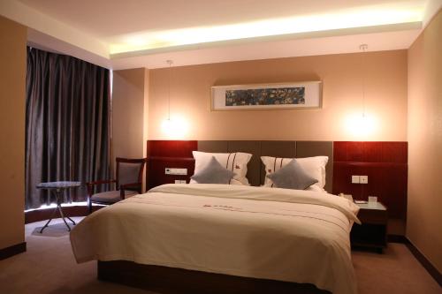 Imagen de la habitación del Kunming Chahua Inn. Foto 7