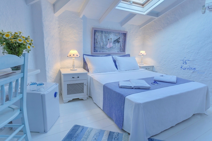 Imagen de la habitación del Kurabiye Otel. Foto 11