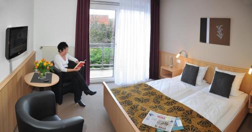 Imagen general del Kurhotel Gr&uuml;ttner mit eigenem Sole Thermal Schwimmbad 32 Grad und Saunalandschaft. Foto 5