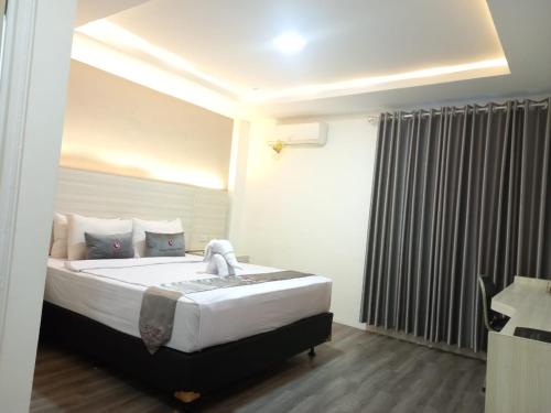 Imagen de la habitación del Kurnia perdana Hotel. Foto 19