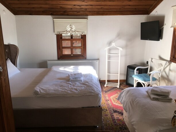Imagen de la habitación del Kuscu Han Otel. Foto 10