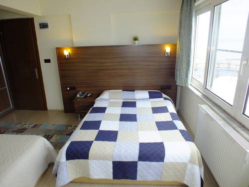 Imagen de la habitación del Kutlugun Sahil Otel. Foto 3
