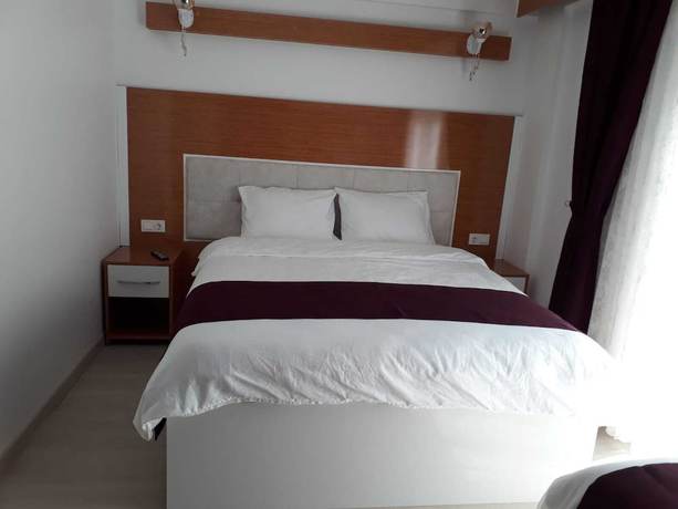 Imagen de la habitación del Kuyas Apart Hotel. Foto 3