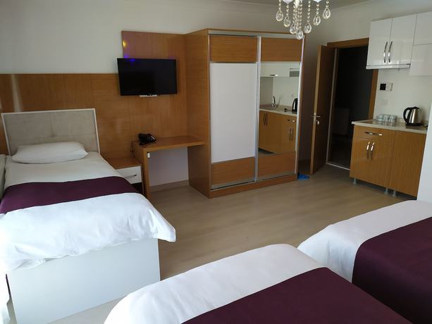 Imagen de la habitación del Kuyas Apart Hotel. Foto 7