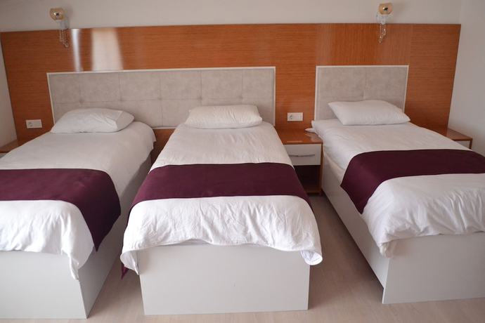 Imagen de la habitación del Kuyas Apart Hotel. Foto 12