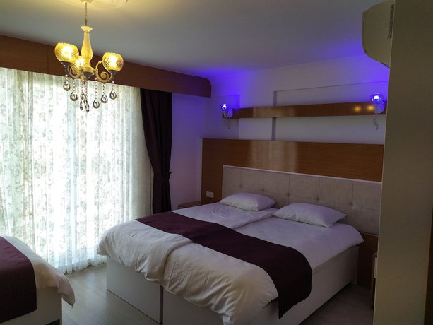 Imagen de la habitación del Kuyas Apart Hotel. Foto 15