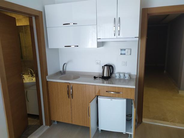 Imagen de la habitación del Kuyas Apart Hotel. Foto 16