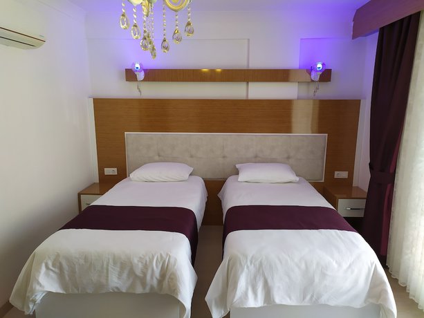 Imagen de la habitación del Kuyas Apart Hotel. Foto 17
