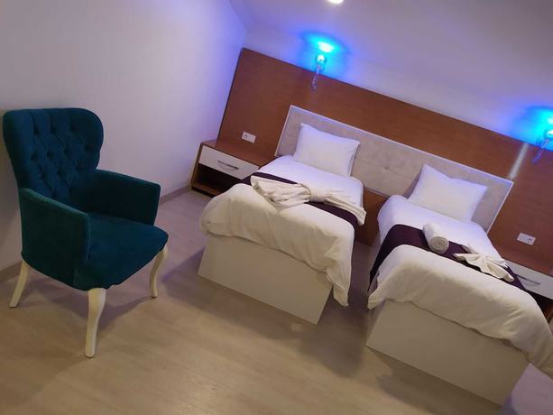 Imagen de la habitación del Kuyas Apart Hotel. Foto 19