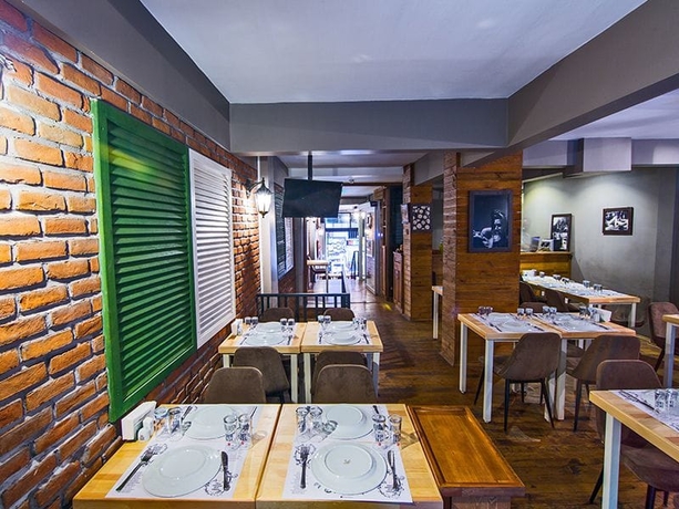 Imagen del bar/restaurante del Kuzen Otel - Adults Only. Foto 2