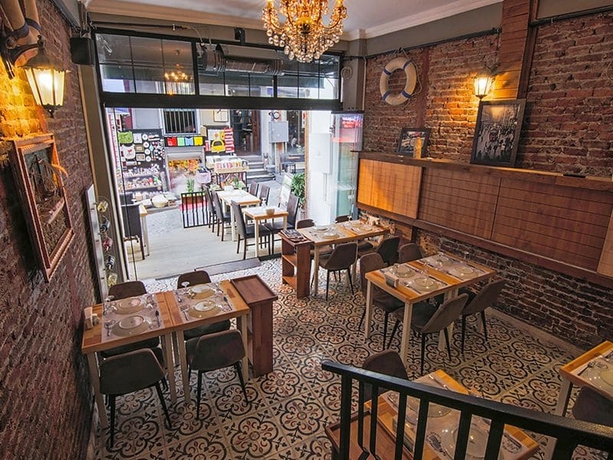 Imagen del bar/restaurante del Kuzen Otel - Adults Only. Foto 4