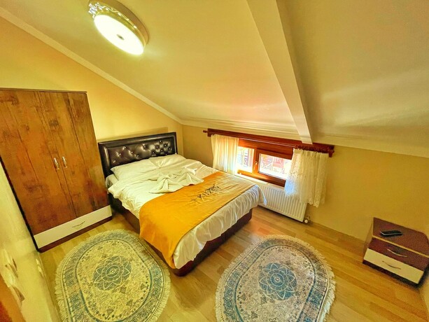 Imagen de la habitación del Kuzey Suites. Foto 16