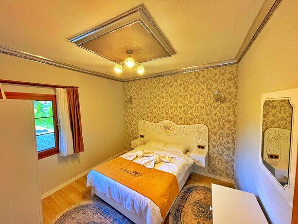 Imagen de la habitación del Kuzey Suites. Foto 18