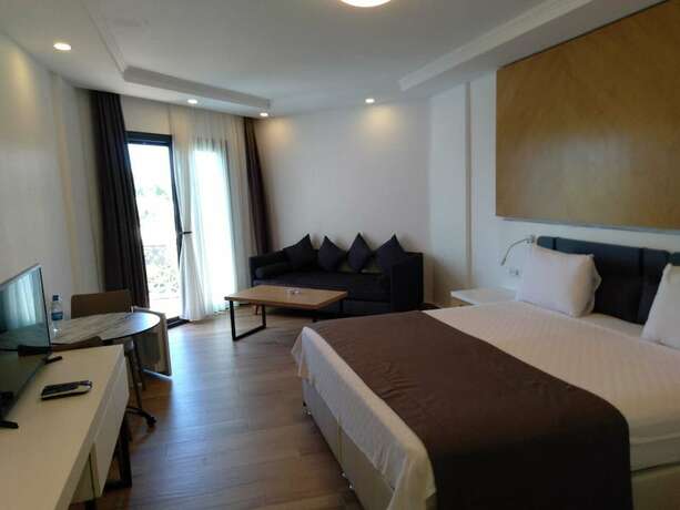 Imagen de la habitación del Kıvan&ccedil; Suite Hotel. Foto 19