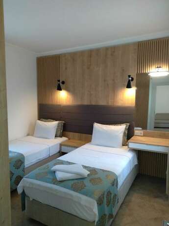 Imagen de la habitación del Kıvan&ccedil; Suite Hotel. Foto 20
