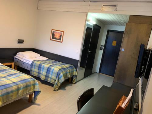 Imagen de la habitación del Kylpyl&auml;hotelli Kiannon Kuohut. Foto 9