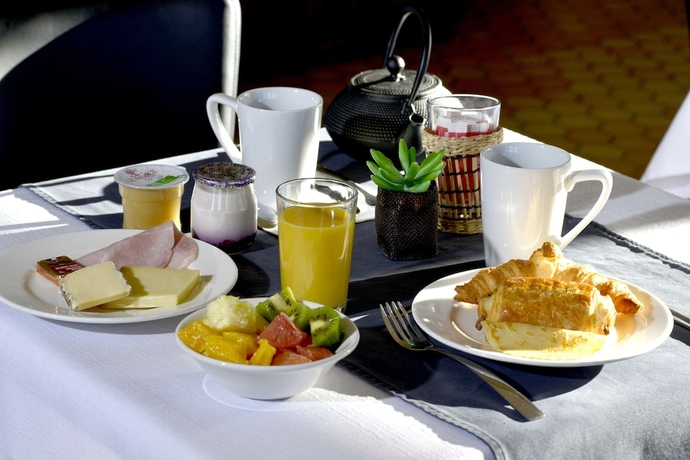 Imagen del bar/restaurante del Kyriad Annecy Nord - Epagny, Le Blanc Chat. Foto 4