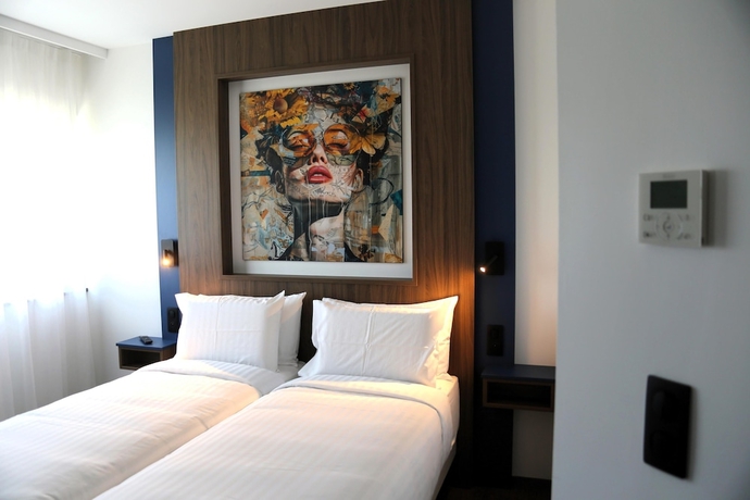 Imagen de la habitación del Kyriad Prestige - Sarrebourg Les Terrasses. Foto 9