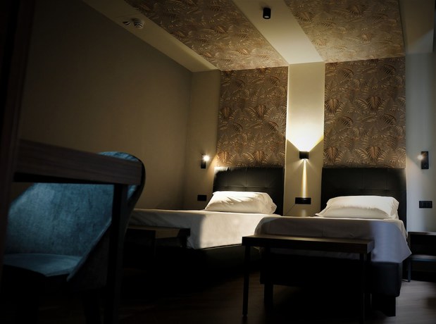 Imagen de la habitación del LAMBERTI BOUTIQUE HOTEL. Foto 9
