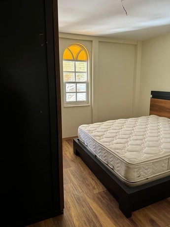 Imagen de la habitación del LEMON PARK HOUSE. Foto 9