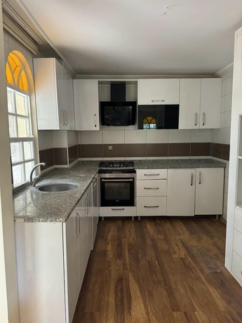 Imagen de la habitación del LEMON PARK HOUSE. Foto 12