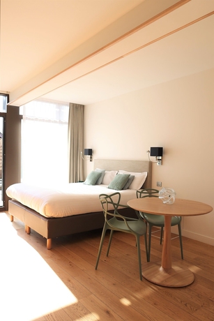 Imagen de la habitación del LES SUITES DU PORT by Le Saint Ferdinand. Foto 2