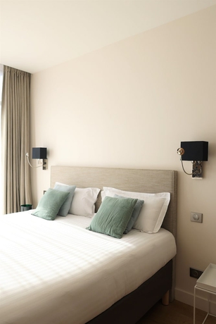 Imagen de la habitación del LES SUITES DU PORT by Le Saint Ferdinand. Foto 3
