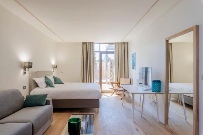 Imagen de la habitación del LES SUITES DU PORT by Le Saint Ferdinand. Foto 4