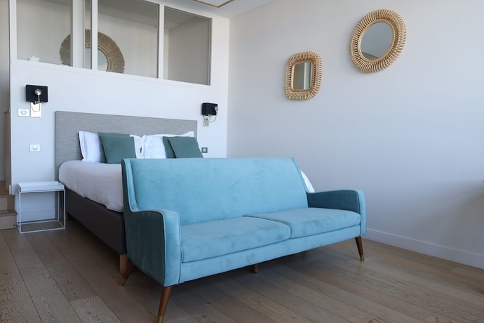 Imagen de la habitación del LES SUITES DU PORT by Le Saint Ferdinand. Foto 8