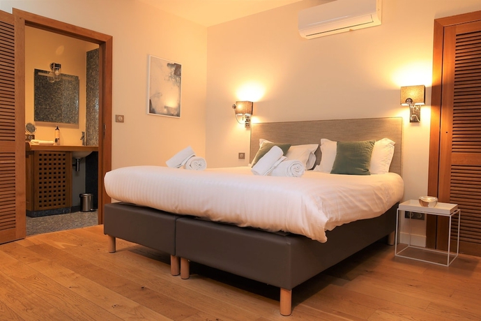 Imagen de la habitación del LES SUITES DU PORT by Le Saint Ferdinand. Foto 10