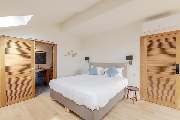 Imagen de la habitación del LES SUITES DU PORT by Le Saint Ferdinand. Foto 11