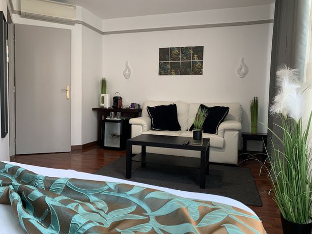 Imagen de la habitación del L\'Embleme Boutique Hotel. Foto 7