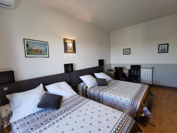 Imagen de la habitación del L\'H&ocirc;tel du Port. Foto 19