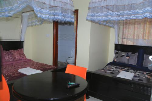 Imagen general del LINK SUITES BAR AND RESSTAURANT MBARARa. Foto 2