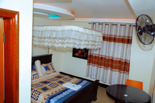 Imagen general del LINK SUITES BAR AND RESSTAURANT MBARARa. Foto 3