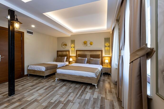Imagen de la habitación del LINNGA HOTEL and SUITE. Foto 17
