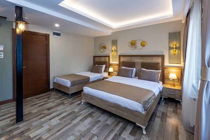 Imagen de la habitación del LINNGA HOTEL and SUITE. Foto 18