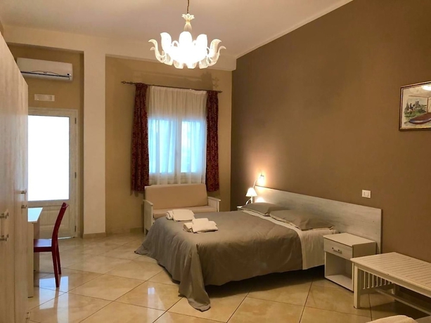 Imagen de la habitación del L\'ISOLA DEI SAPORI BOUTIQUE HOTEL. Foto 10