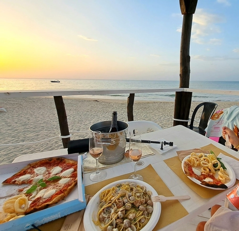 Imagen del bar/restaurante del L\'ISOLA DEI SAPORI BOUTIQUE HOTEL. Foto 9