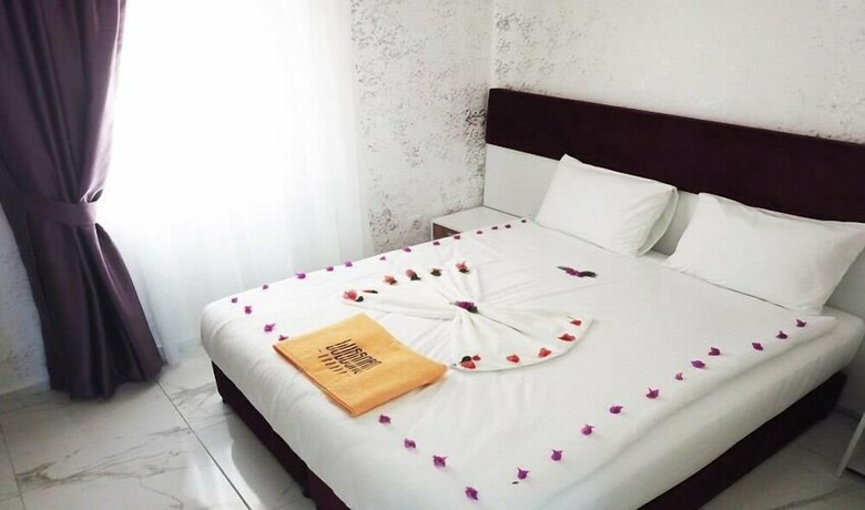 Imagen de la habitación del LİMAN BEACH HOTEL. Foto 11