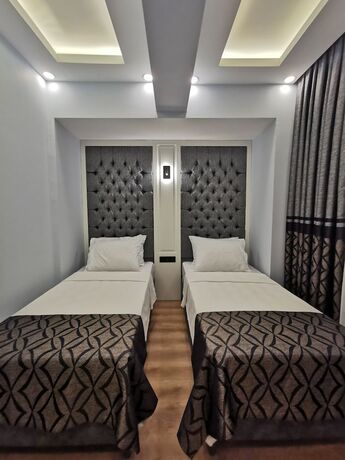 Imagen de la habitación del LUXX GARDEN HOTEL. Foto 17