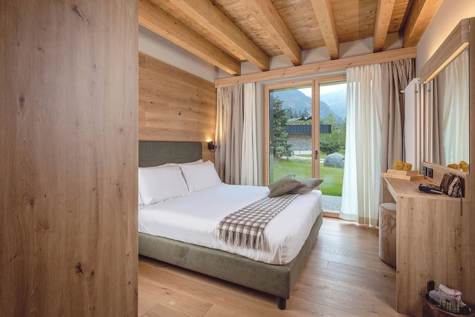 Imagen de la habitación del LVG Hotel Collection - Cascata d\'Otro Mountain Lodge. Foto 4