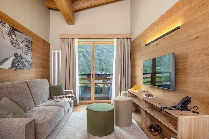 Imagen de la habitación del LVG Hotel Collection - Cascata d\'Otro Mountain Lodge. Foto 12
