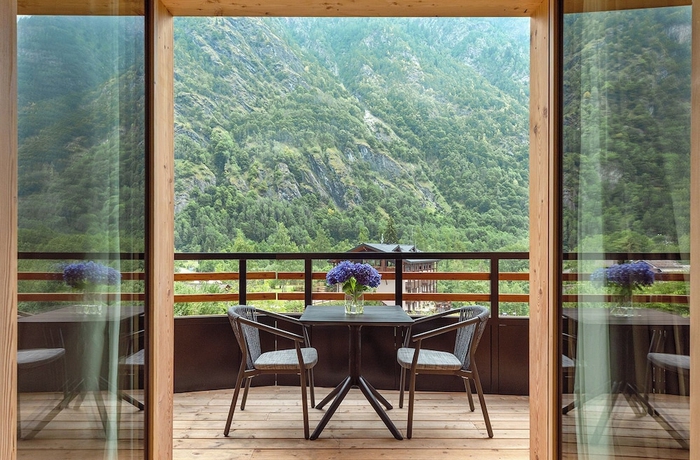 Imagen de la habitación del LVG Hotel Collection - Cascata d\'Otro Mountain Lodge. Foto 15