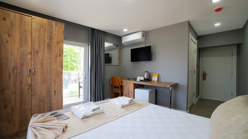Imagen de la habitación del La Cactus Boutique Hotel. Foto 8