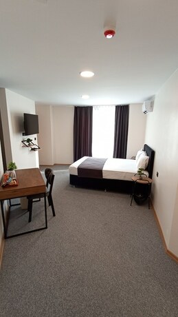 Imagen de la habitación del La Casa De Airport Hotel. Foto 15