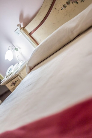 Imagen de la habitación del La Castellaia Resort. Foto 15