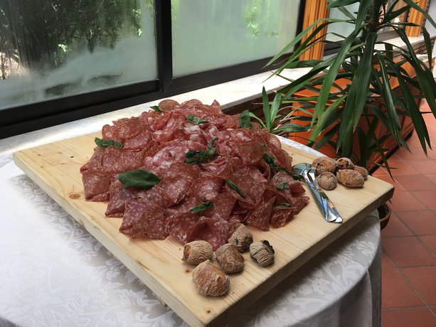 Imagen del bar/restaurante del La Cittadella Dell\'Oasi Hotel. Foto 5