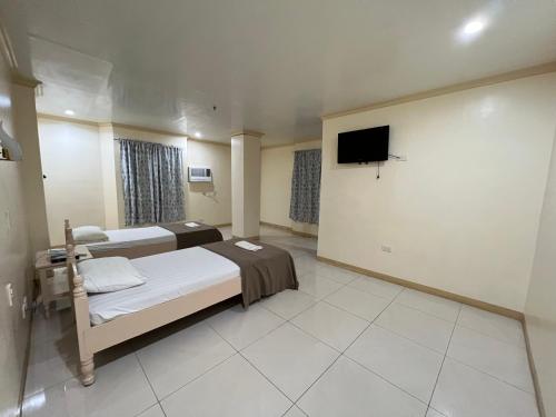 Imagen de la habitación del La Elliana Hotel & Restaurant, Inc.. Foto 9