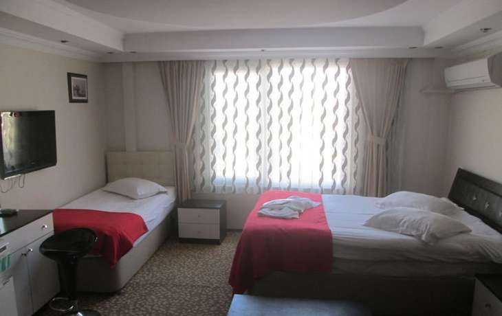 Imagen de la habitación del La Fontaine Guzelyali Hotel. Foto 5